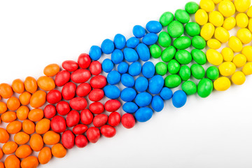 Colored chocolate candies, isolated on white background