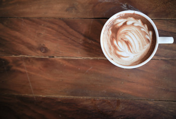 top view coffee cup on wooden table