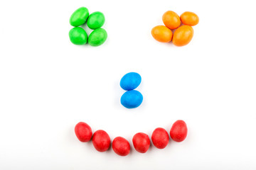 Colored chocolate candies, isolated on white background