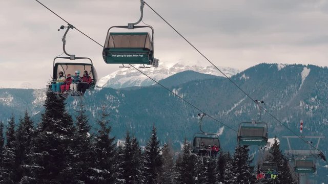 Chair lift with snowy mountain view at ski resort in Austria