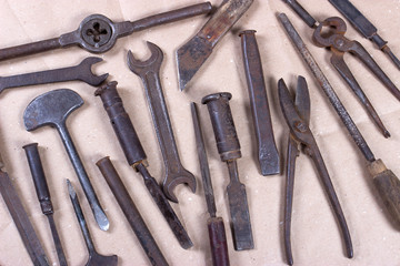 Wrenchs,various tools on wooden background