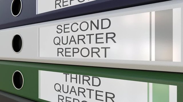 Office binders with Quarter and annual reports tags