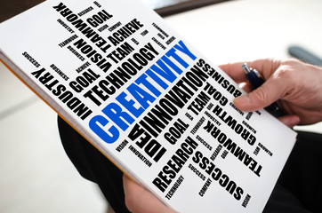Creativity word cloud concept on a paper