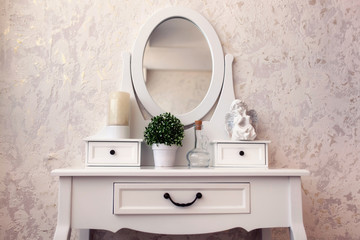 Beautiful wooden dressing table with mirror on white background wallpaper