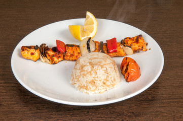 Grilled meat dish of shish kebab with onion
