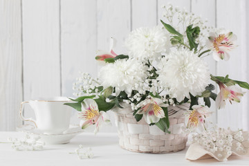chrysanthemum in basket on white background