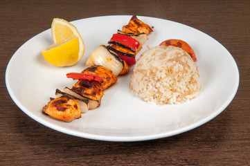 Grilled meat dish of shish kebab with onion