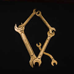 Letter Q. Alphabet made of golden repair tools