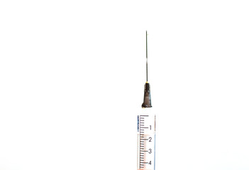 Syringe with medicine on white background.
