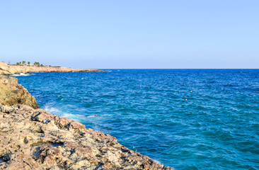 Stony sea shore on a sunny day. Cyprus