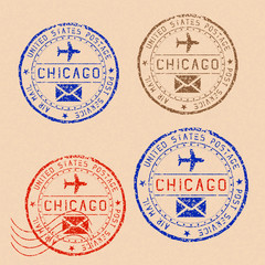Collection of CHICAGO postal stamps partially faded on beige paper background
