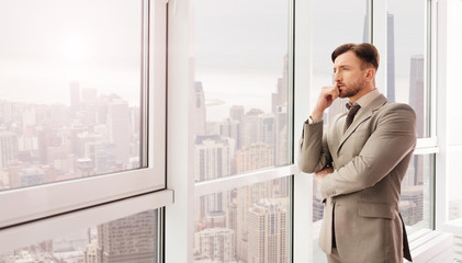 Businessman looking at city