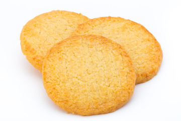 Stacked short pastry cookies isolated on white background.