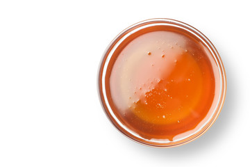 Fresh honey in a glass bowl, Top view,