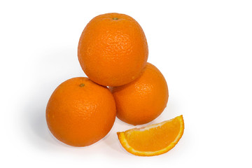 Three oranges and slice isolated