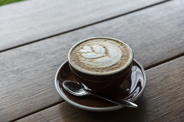 Cup of coffee with beautiful Latte art