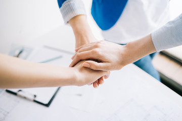 Close up of hands business team showing teamwork, togatherness, cooperation