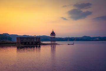 Fototapeta premium sunset river in Mon Bridge in Kanchanaburi,Thailand