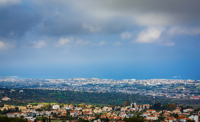 Panoramic view of city, forest, sky with clouds and sea. Paphos, Cyprus