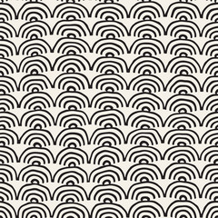 Monochrome minimalistic seamless pattern with arcs. Simple hand drawn texture. Vector background with rounded inky lines 