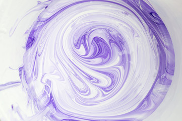 purple and white paint mixed abstraction