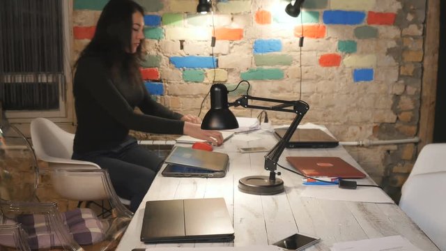 Young people start working in the office with laptops