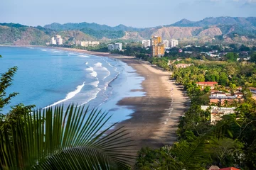 Foto op Aluminium Tropical wide sandy beach of the town of Jaco, Costa Rica © Dudarev Mikhail