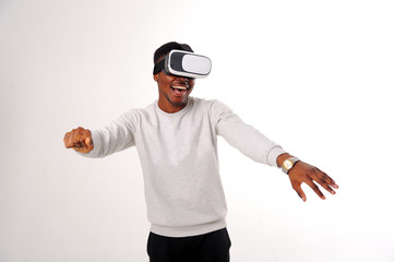 Black guy with virtual reality glasses isolated on white