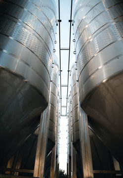 Row Of Steel Cisterns For Wine Storage Outside