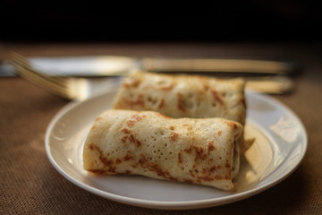 Pancakes with filling (stewed cabbage with vegetables)