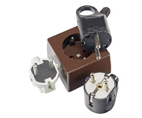 electrical plug and electric socket on white