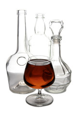 Bottle with brandy and cognac on white background