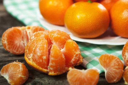 Fresh tangerine on wooden table