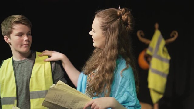  Young student actors in rehearsal for school theatre production