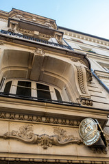 A plate of notary illustrating the sale of real estate and inheritance rights.