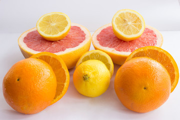 Citrus fruits being cut in half