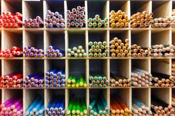 Multicolored pencils in art store closeup