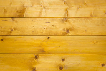 Abstract texture of treated, stained and polished wood with natural spots, scars and marks