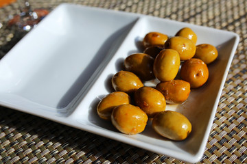 bowl with green olives- traditional spanish tapa