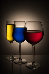 Still-life of glasses with the colored liquid