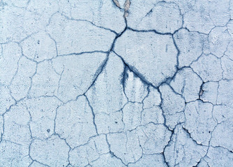 Damaged blue color old wall surface.