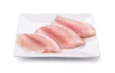 Plate with fresh raw fish fillet