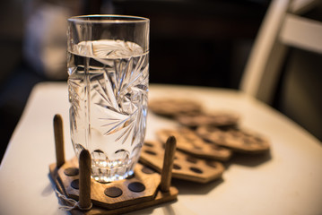 Coasters with Chocolate Cookie design and Water Glass
