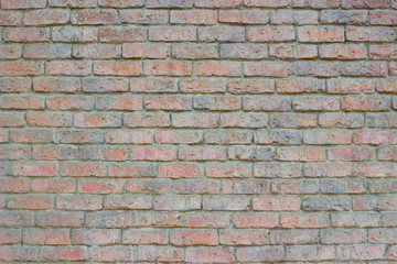 Old colored brick wall background