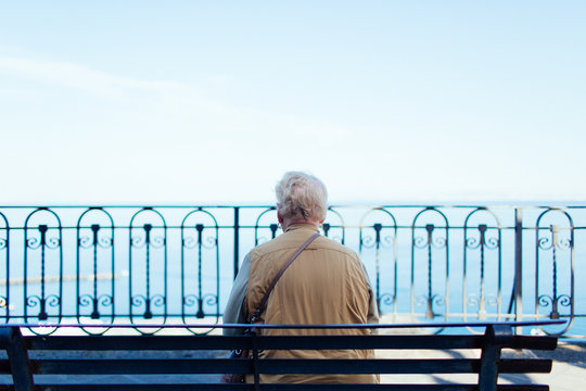 Elderly woman looks at coast in Piano di Sorrento