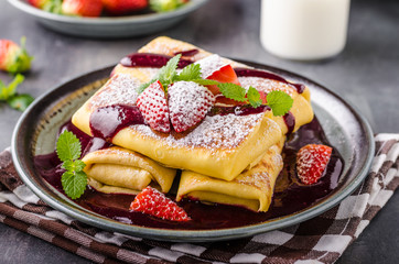 Filled pancakes with strawberries