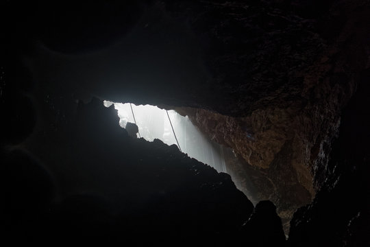 Explore the stunning underground view of the Ecuador Mayei Cave entrance for an unforgettable adventure.