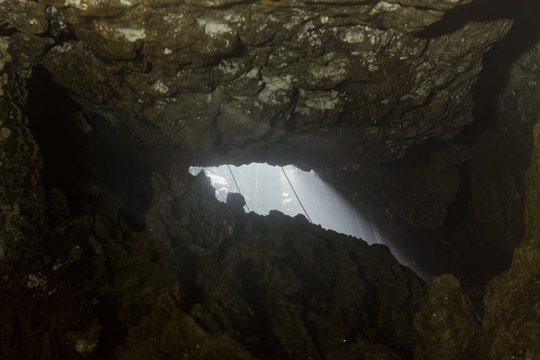 Explore the captivating underground view of Ecuador's enchanting Mayei Cave entrance,a must visit destination for an unforgettable adventure.