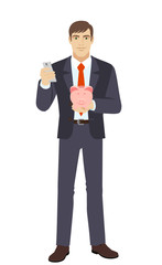 Fototapeta premium Businessman with mobile phone and piggy bank
