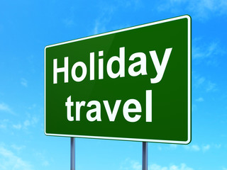 Travel concept: Holiday Travel on road sign background